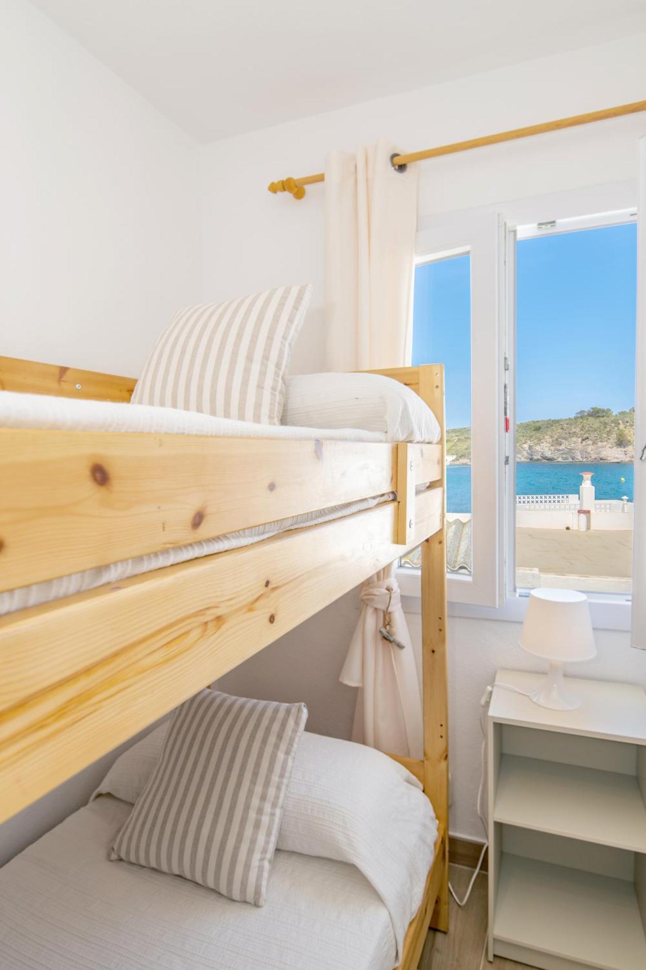 Fantástico apartamento en primera línea de mar en Menorca Es Grau Exterior foto